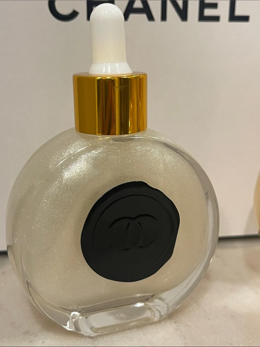 CHANEL Illuminating Shimmering Body Oil Fragrance Drop Bottles.